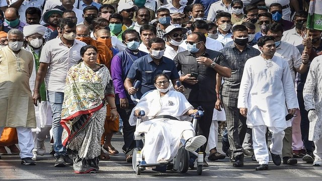 Mamata Banerjee holds roadshow on wheelchair in Kolkata