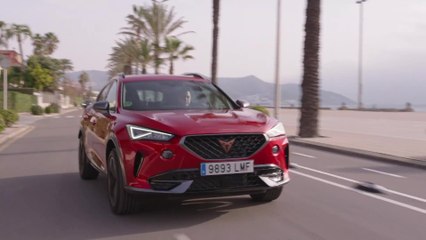 CUPRA Formentor 150 CV in Desire Red Driving in the city