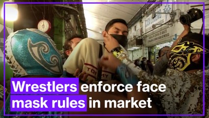 Lucha libre wrestlers enforce mask rules in Mexico City