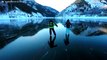 Família patina no gelo numa paisagem deslumbrante