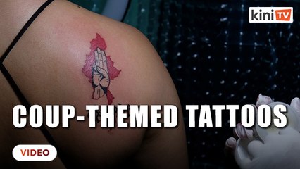 Myanmar protesters express despair with tattoos