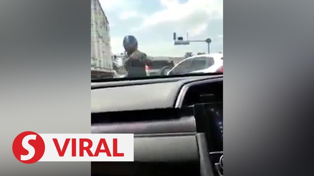 Police arrest motorcyclist in viral road rage video