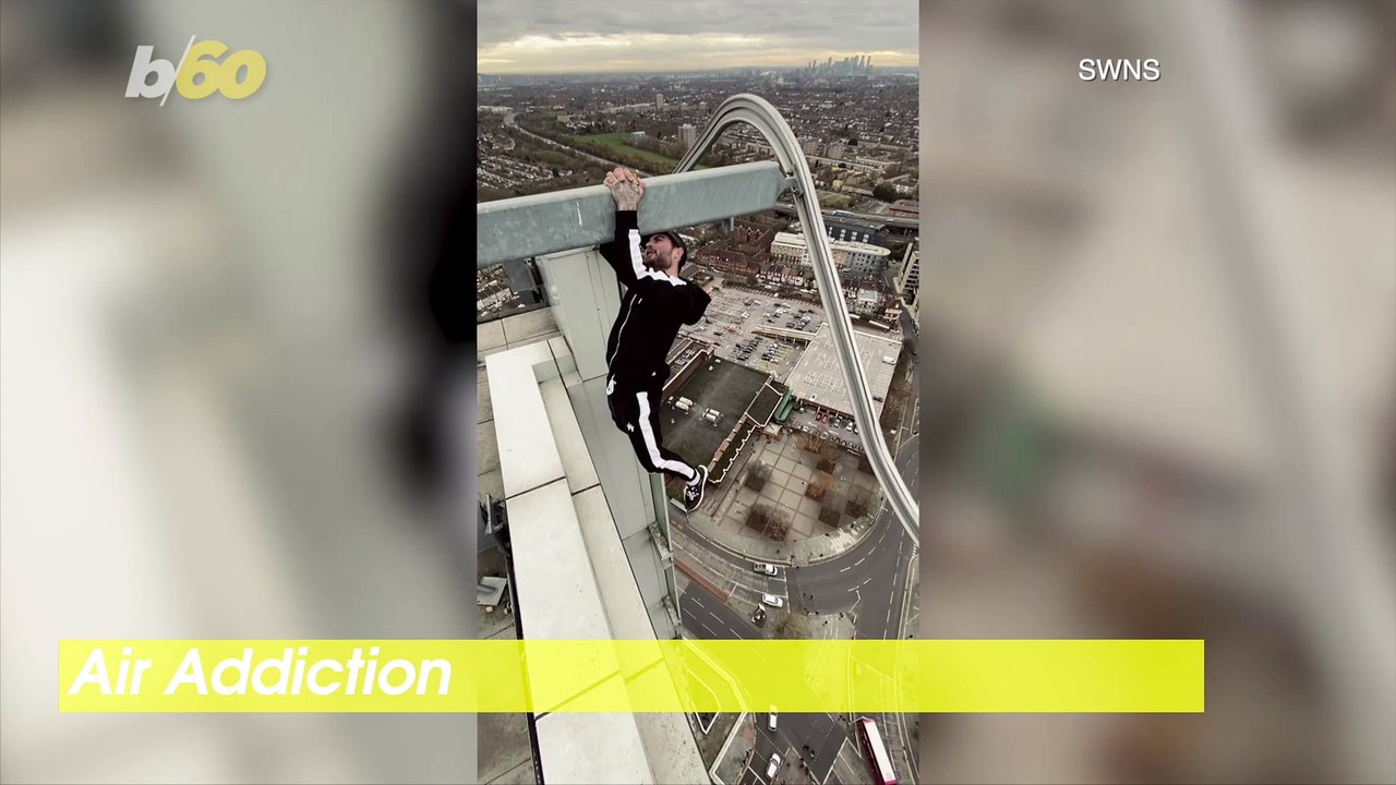Exercise at High Altitude! Watch This Daredevil Do Pull-UPS High Above Traffic on a 40 Story Skyscraper!