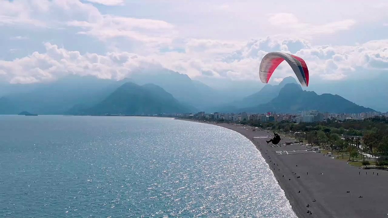 Para Gliding over the blue sea