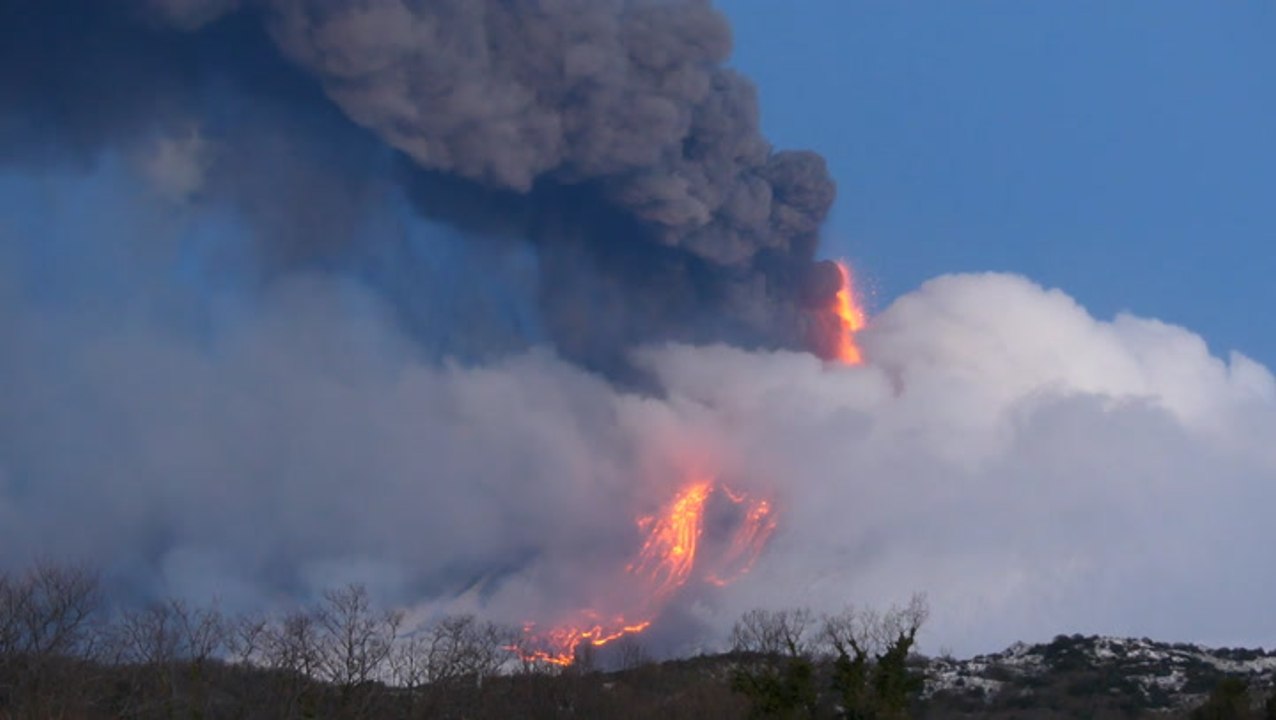Lava spews from Italy's Mount Etna