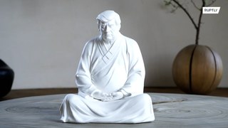 Make your inner peace great again with this Trump Buddha statue!