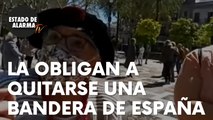 Obligan a una mujer a quitarse una bandera de España para poder acudir a un acto de Vox