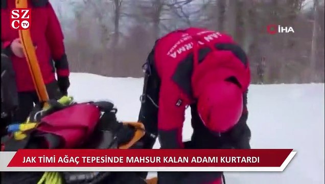 Paraşütle düşen vatandaş ağacın tepesinde mahsur kaldı