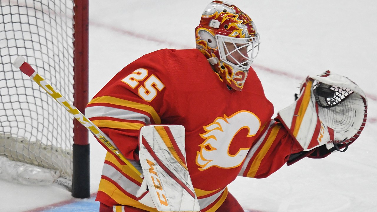 Markstrom dives over to rob Matthews