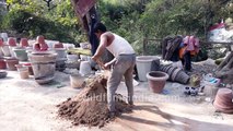 Flower pot making from cement mixture in India __ Vases cast from plastic models