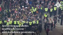 Aerial footage of scuffles between anti-lockdown protesters and police in London