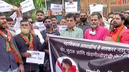 Descargar video: BJP stages protest against Maharashtra HM; demands narco test of Uddhav Thackeray, Anil Deshmukh