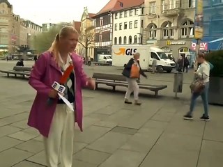 Pedestrian Takes out Cyclist with his Umbrella during Live TV Broadcast