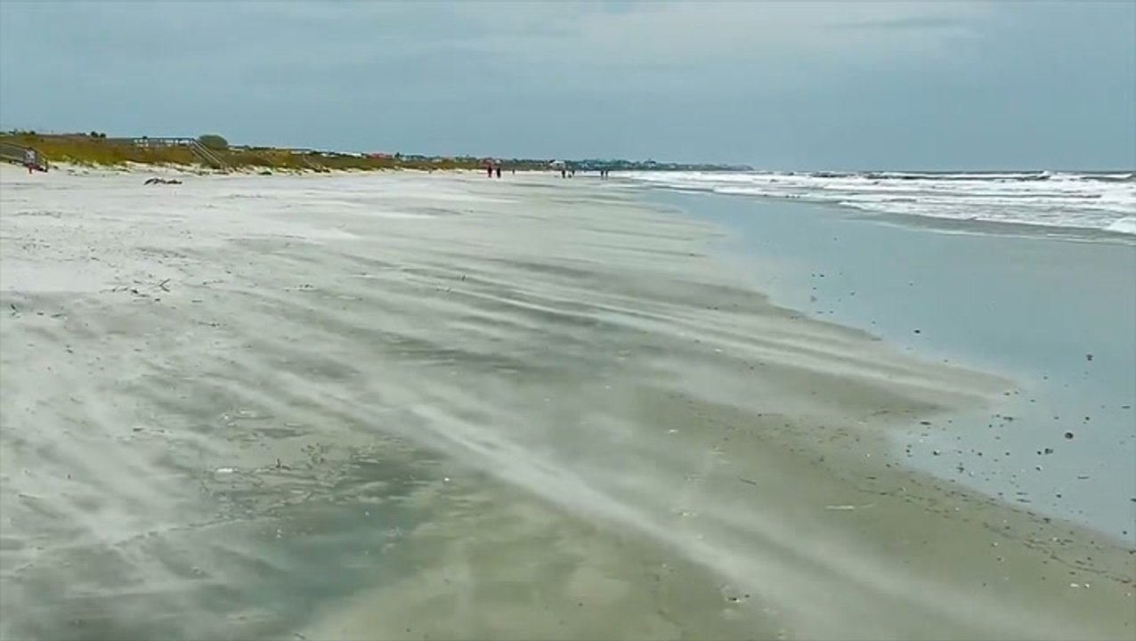 Storm off the east coast brings gusty winds to the Carolinas