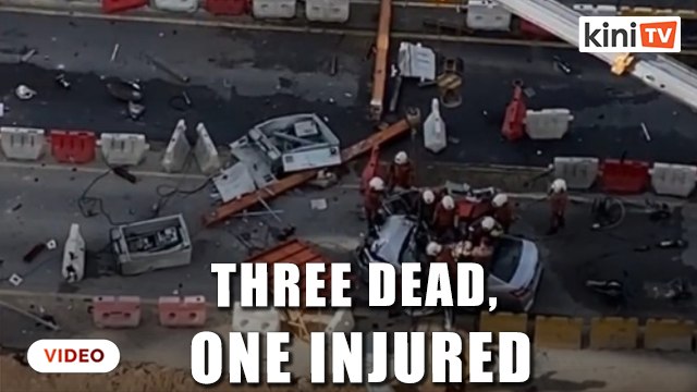 Three dead after crane topples onto car at construction site