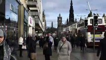 Edinburgh's Princes Street in 2017 and after a year of Covid-19 lockdown