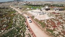Sadakataşı, İdlib'teki 250 briket evi savaş mağdurlarına teslim etti