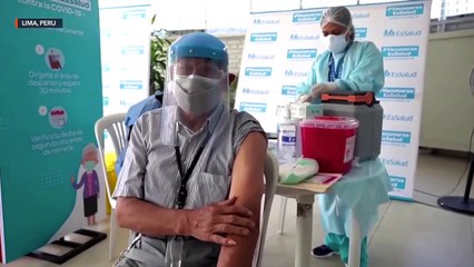 Man in Peru dances with joy after receiving COVID-19 vaccine