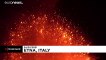 Mount Etna erupts, spewing lava and lighting up night skies once again