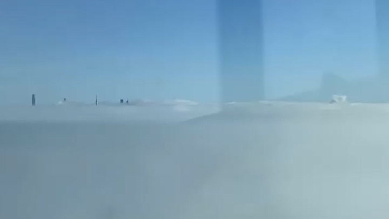 New York skyscrapers peak out from fog