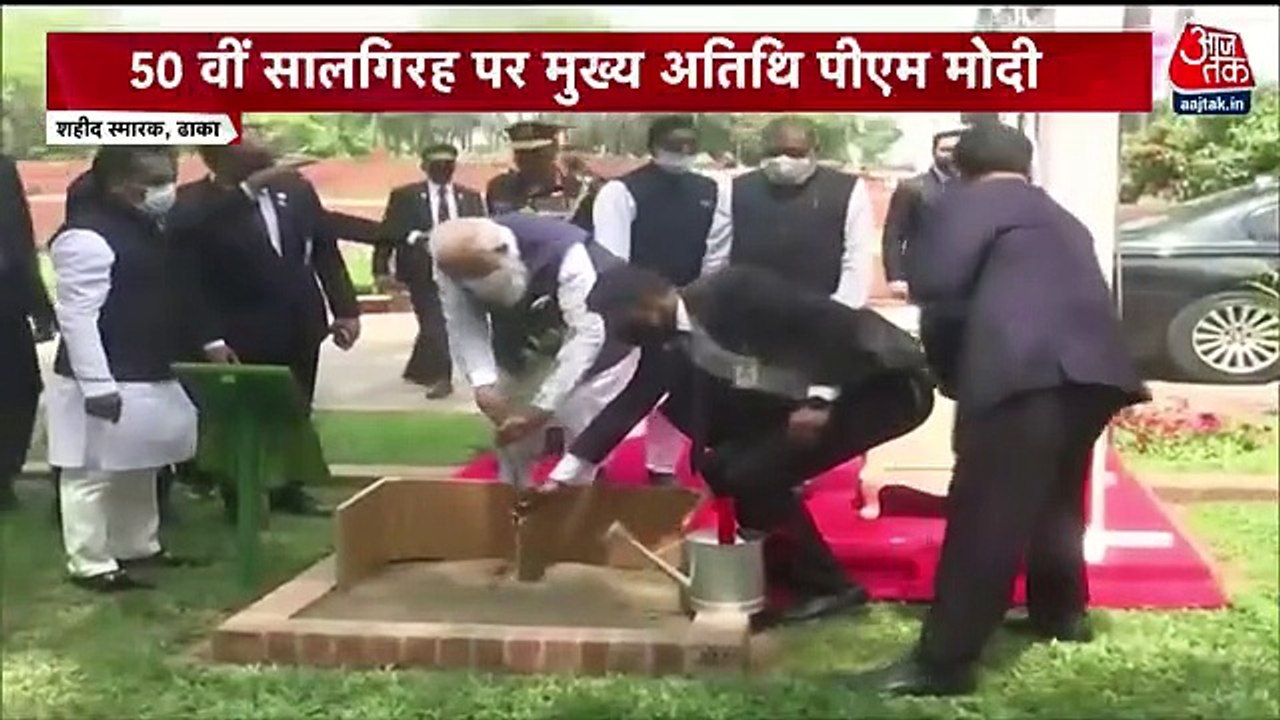 Dhaka: PM Modi plants sapling at National Marty...