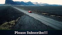 Car Driving Through Icelandic Landscape