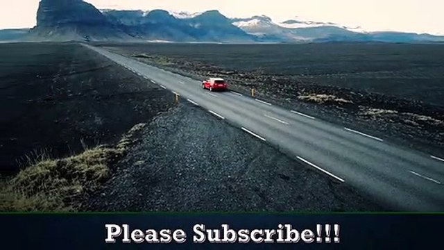 Car Driving Through Icelandic Landscape