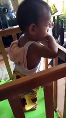 Standing Cute Baby Starring at Something