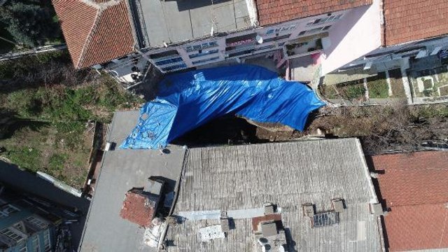 Bursa'da istinat duvarının çökmesiyle hasar gören binalarda hasar tespit çalışması sürüyor