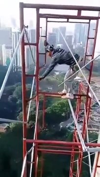 These Construction Worker Working at Height Without Safety Harness
