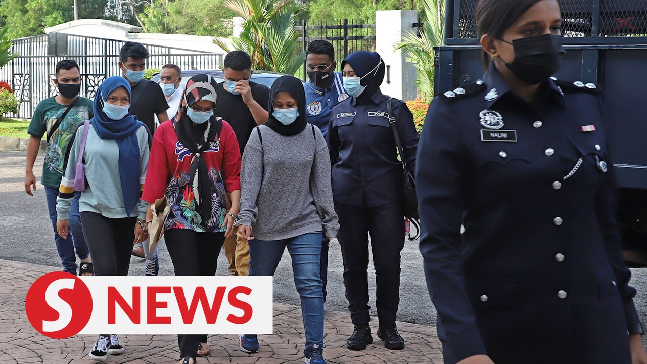 Six factory workers charged with using fake MC