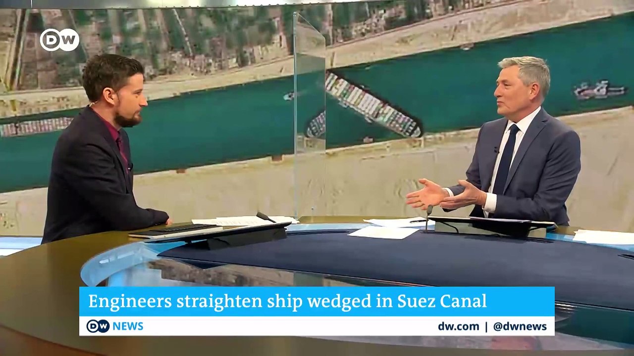 Container ship blocking the Suez Canal partiall...