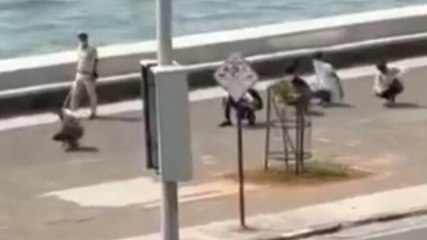 Download Video: Watch | Face mask violators made to do ‘murga walk’ by police at Mumbai's Marine Drive