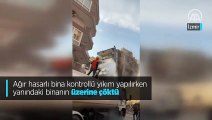 Ağır hasarlı bina kontrollü yıkım yapılırken yanındaki binanın üzerine çöktü