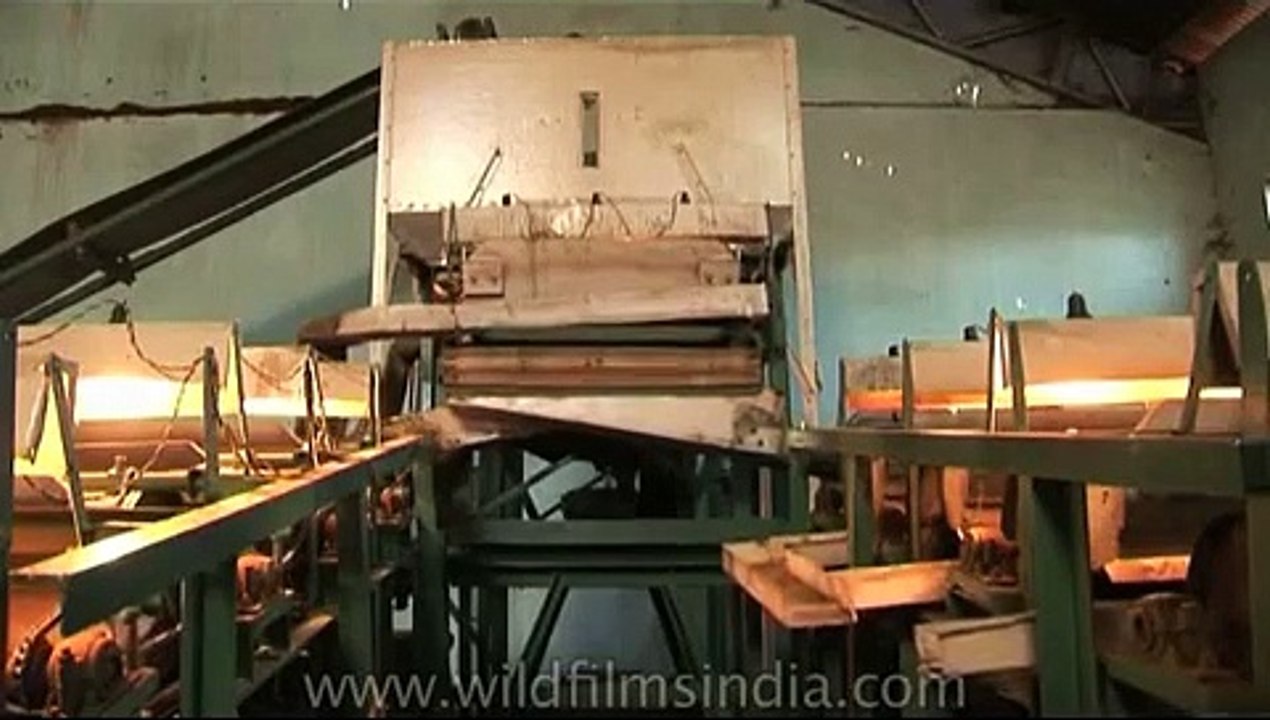 Traditional process of packing tea in tea bags, in a Tea Estate in India