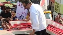 Watch: Kamal Haasan throws away MNM symbol torchlight in frustration during campaigning