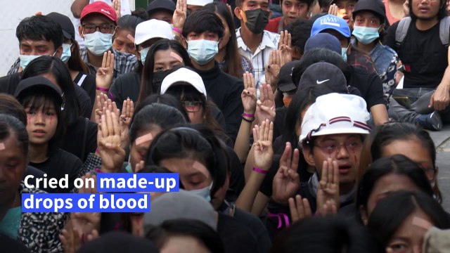Myanmar anti-coup protesters don red 'blood' tears