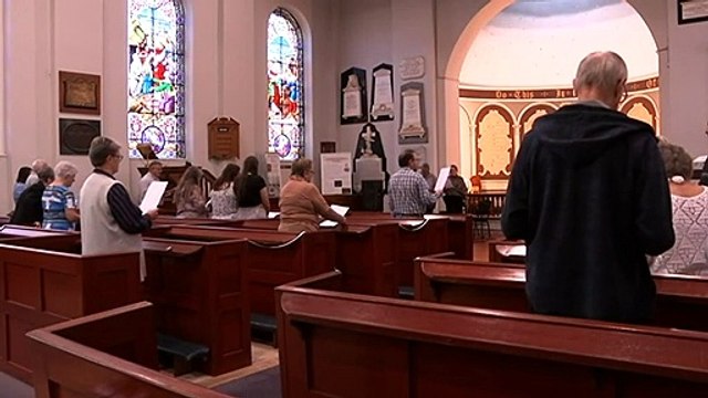 Parishioners gather in flood zone for Easter services