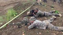 US  Marines and Japanese Ground Self Defense Force put Rounds Down Range