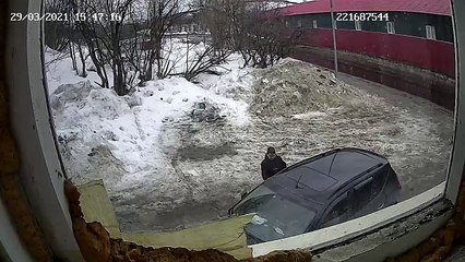 Block of Ice Falls onto Parked Car