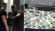 Baskın düzenlenen evden valizlere gizlenmiş 4 milyon sahte dolar çıktı