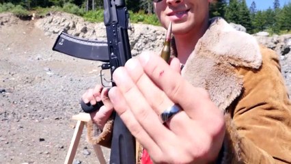 I PHONES  VS   AK 74  BULLET  -----how many Iphones survive ?