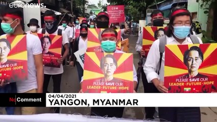 Myanmar protesters carry eggs in Sunday demo