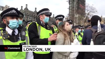 London police clash with protesters against new crime law