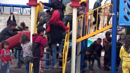 - Briket evlerine kavuşan Suriyeli çocuklar, ilk kez parkta oyun oynadı