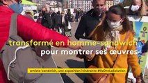 Un artiste-sandwich propose une exposition itinérante dans les rues de Clermont-Ferrand