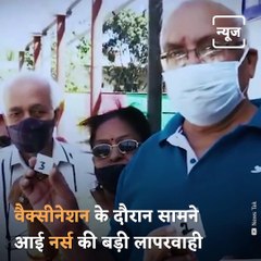 Busy Talking On The Phone Healthcare Worker Injects A Woman Twice With Covid Vaccine