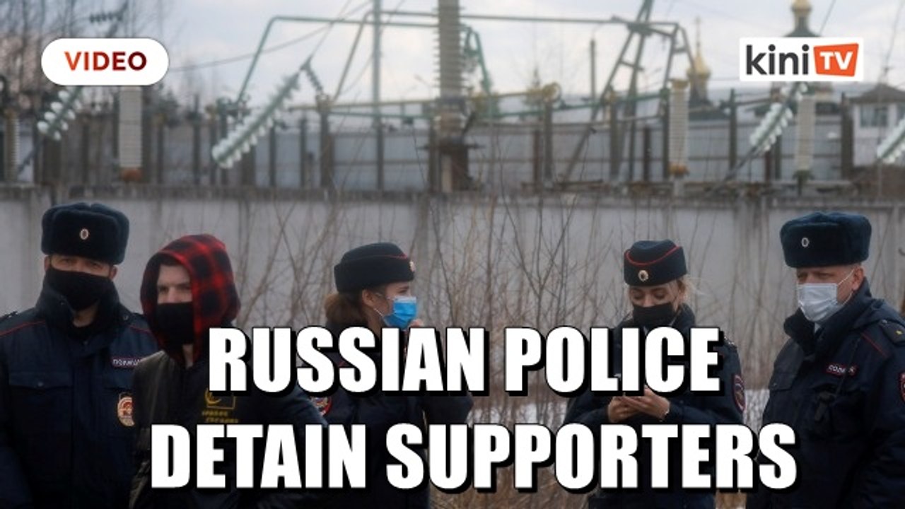 Russian police detain supporters of Kremlin critic Navalny outside prison holding him