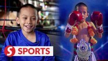 Muay Thai child boxer punching out of poverty