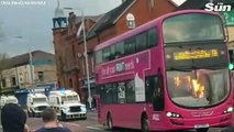 Bus firebombed and police attacked during latest night of violence in Belfast